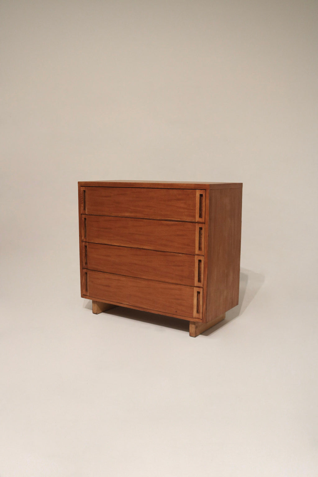 Main front view of vintage solid wood dresser chest of drawers with stained walnut finish, sturdy frame and four spacious drawers