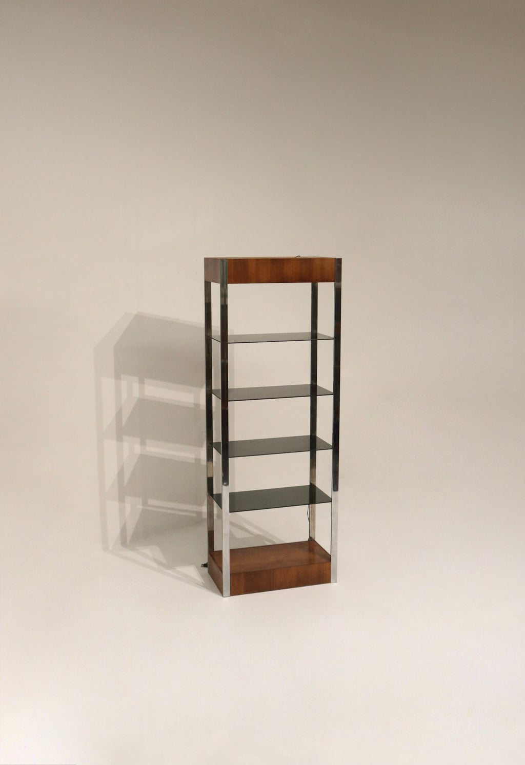 Vintage bookcase with chrome frame and glass shelves