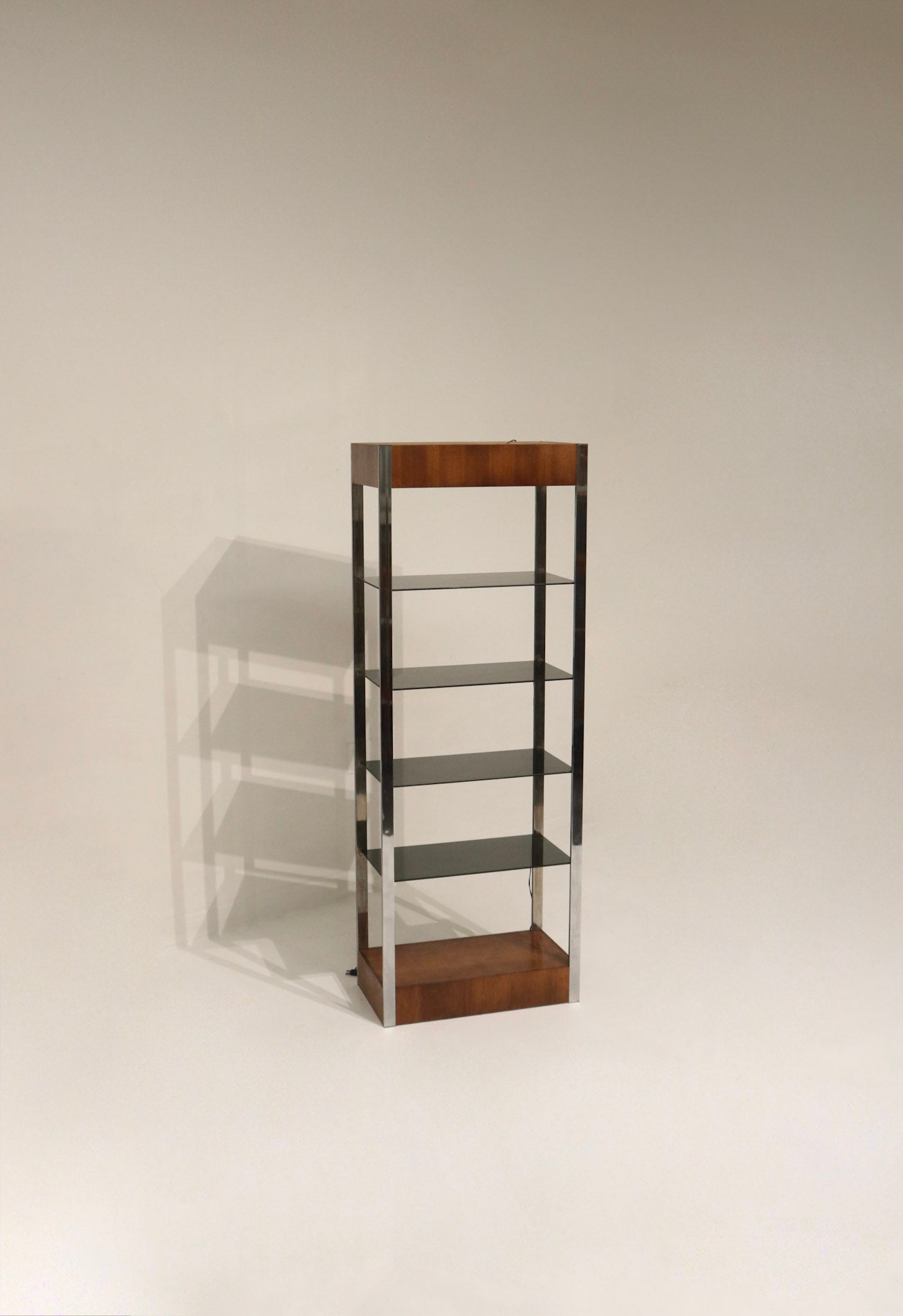 Vintage bookcase with chrome frame and glass shelves