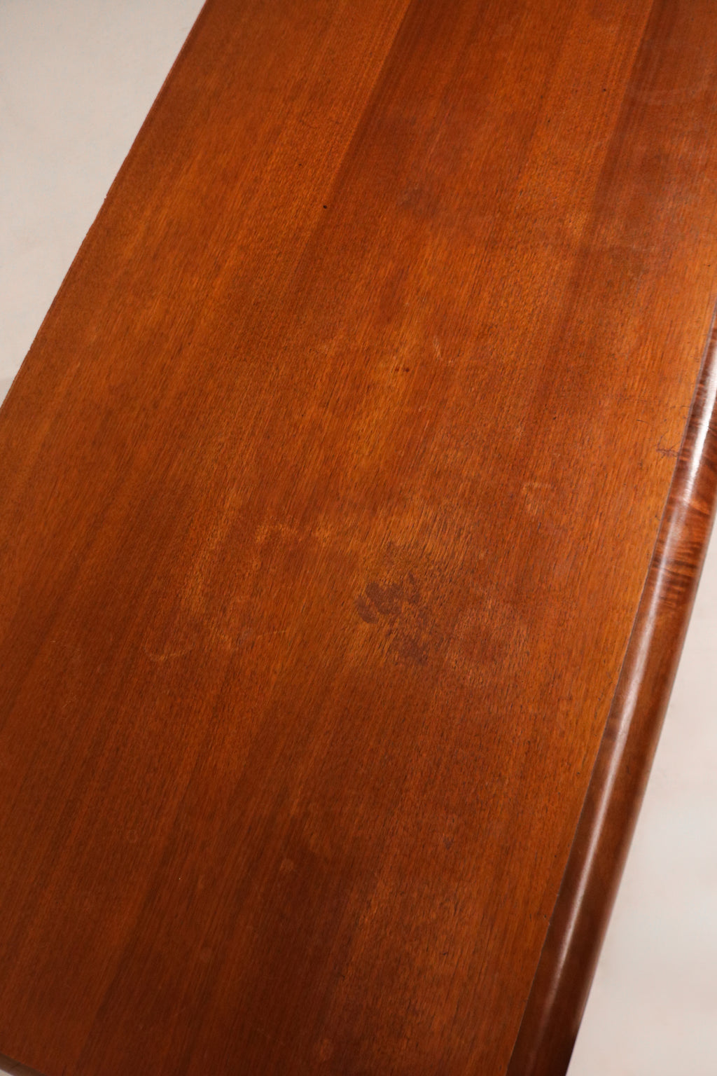 Angled full dresser shot showing all three drawers evenly aligned in a polished finish