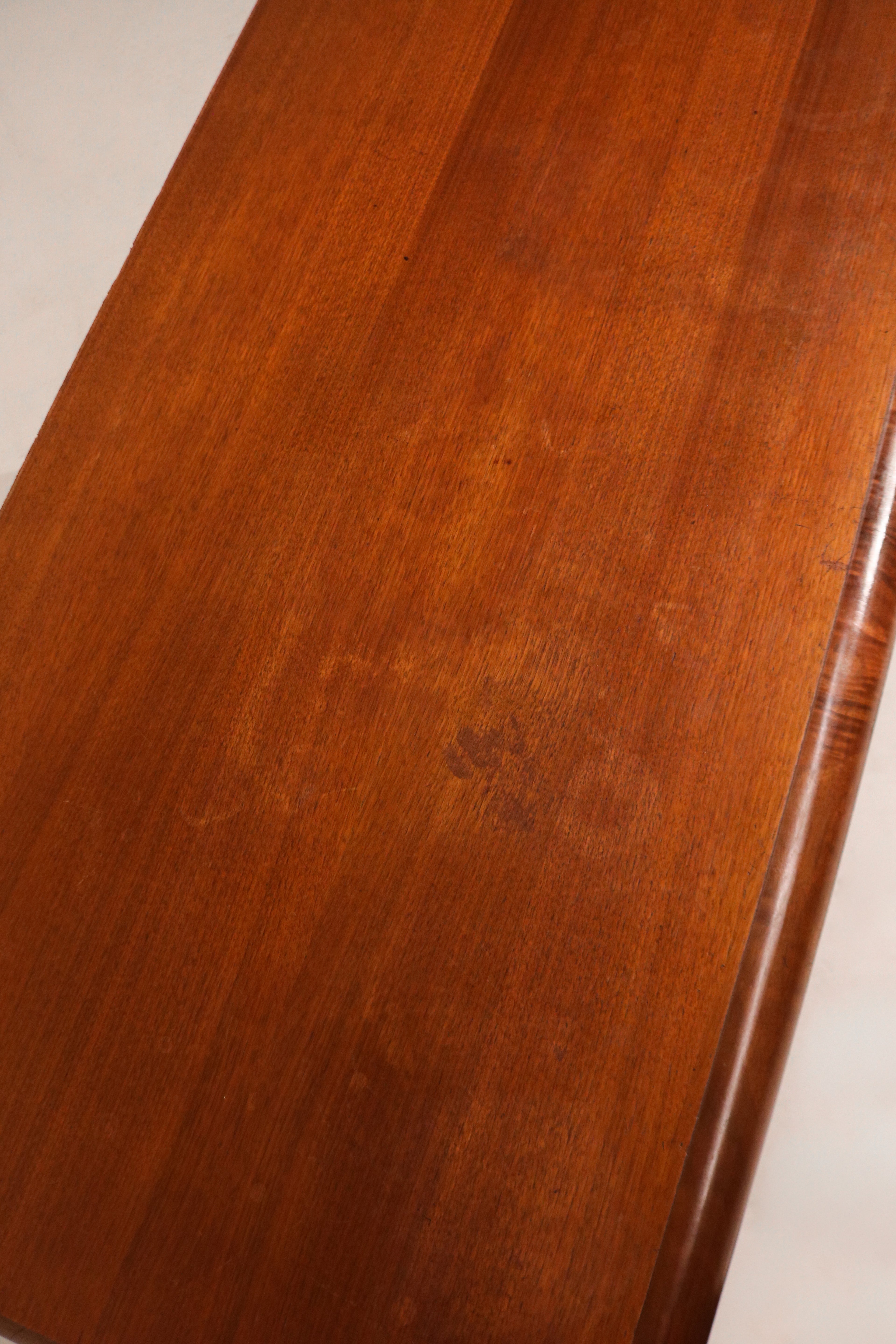 Angled full dresser shot showing all three drawers evenly aligned in a polished finish