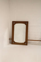 Full view of vintage solid oak wood frame wall mirror with warm natural oak grain, distressed finish and visible scratches.