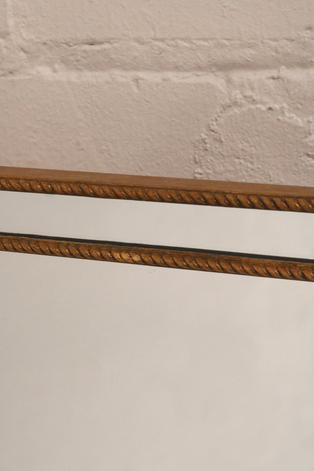 Angle view of the mirror showing reflective surface and sturdy construction