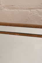 Angle view of the mirror showing reflective surface and sturdy construction