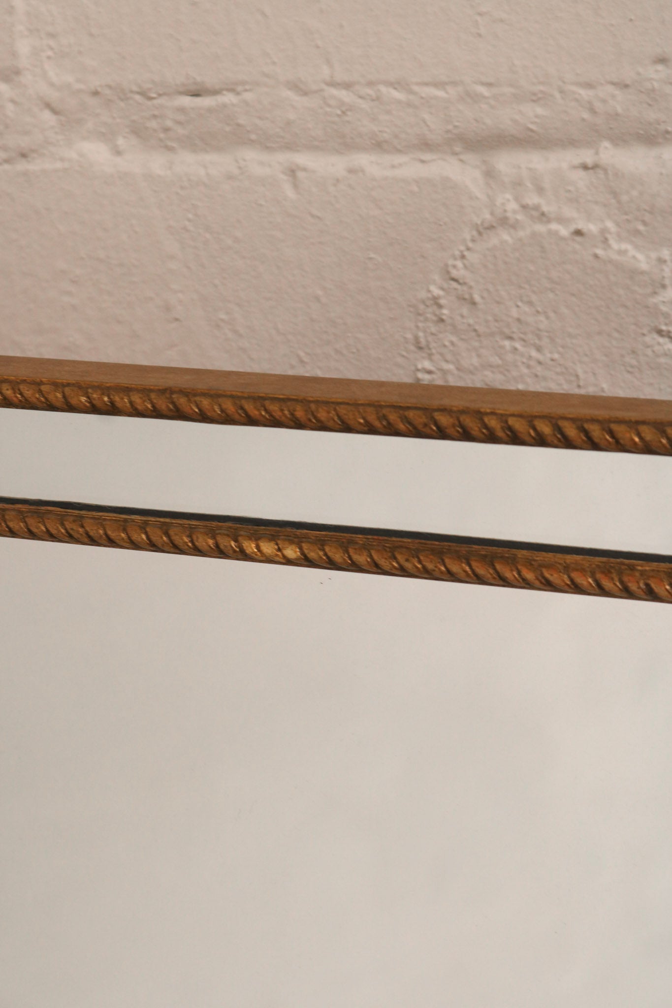 Angle view of the mirror showing reflective surface and sturdy construction