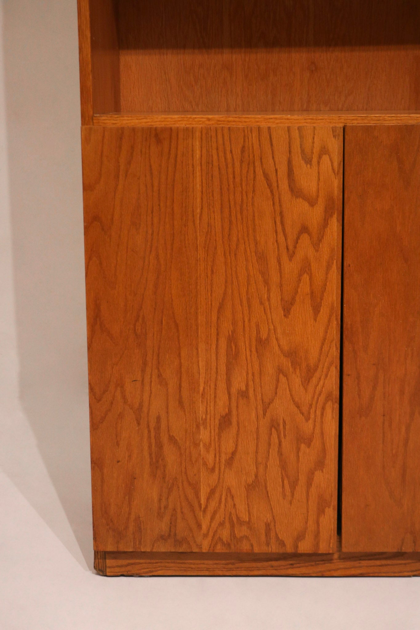 Interior view with shelves removed, showing depth and build of the oak wood Mcm bookcase