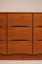 Image showing recessed drawer handles carved into the wood for a sleek look