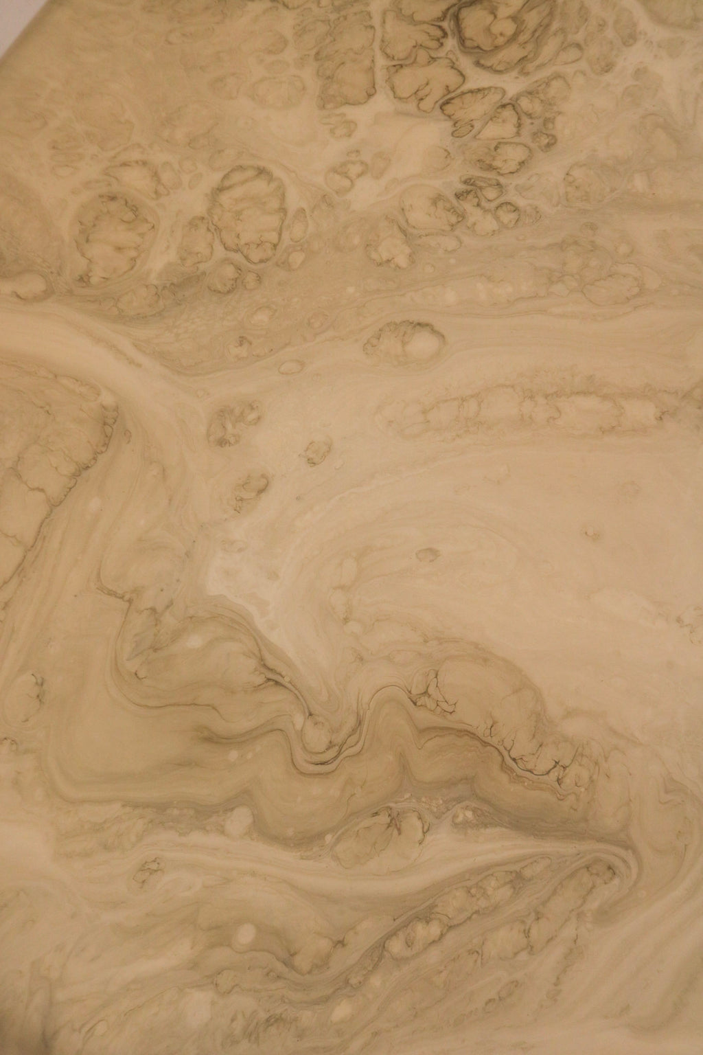 Underside construction detail revealing solid structure and resin layering on vintage coffee table