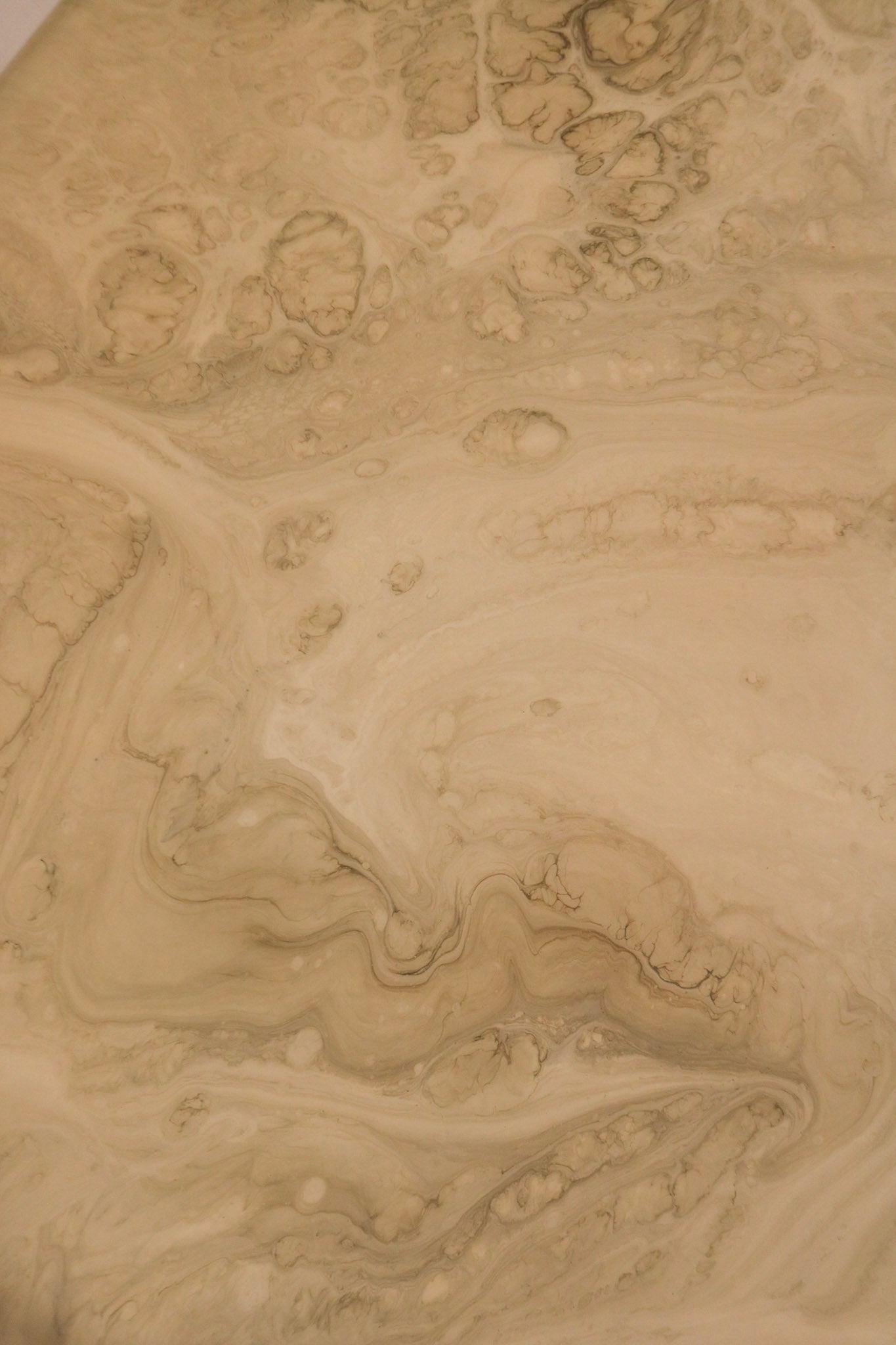 Underside construction detail revealing solid structure and resin layering on vintage coffee table