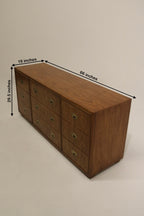 Brass handled walnut drawer cabinet in pristine condition