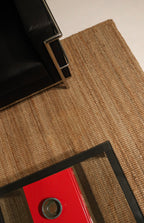 Image of the rug's backside showing clean, pet-free and smoke-free condition and underside weave