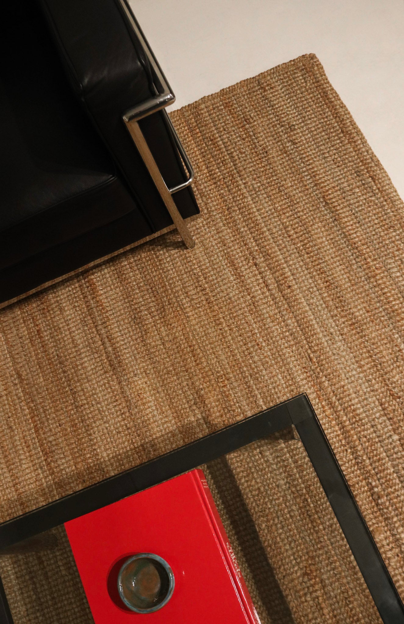 Image of the rug's backside showing clean, pet-free and smoke-free condition and underside weave