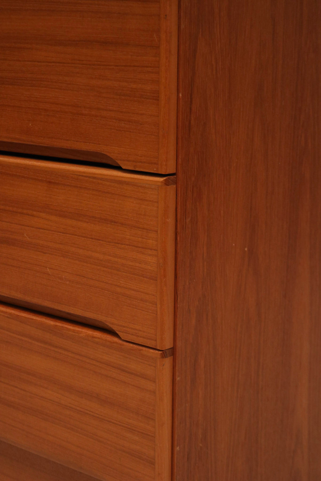 Side profile of the dresser highlighting its clean lines and low profile design