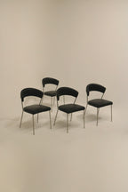 Set of 4 black vinyl dining chairs