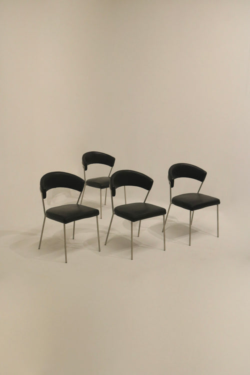 Set of 4 black vinyl dining chairs