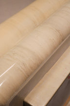 Close-up of resin finish showcasing marbled texture and high-gloss surface from 1980s design