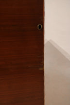 Detailed corner view showing curved Art Deco edges and natural grain wood texture
