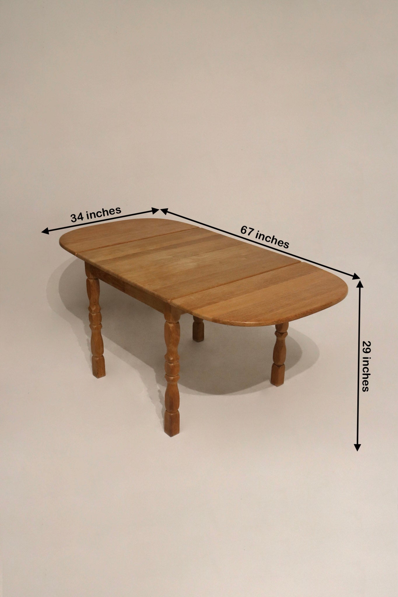 Close-up of minor scratches on the Danish table