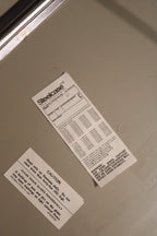 Zoomed-in view of the powder-coated metal finish of the chair legs