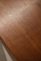 Side profile: pair viewed from side displaying slim MCM silhouette, walnut finish, drawer depth and proportional scale