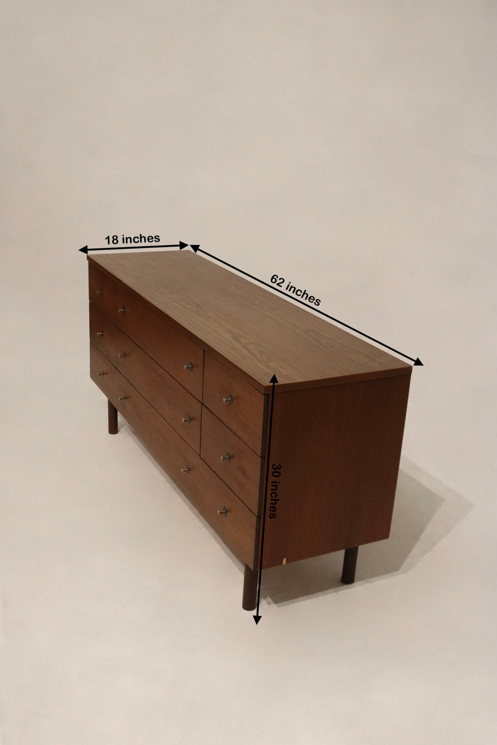 Size reference of the Mid Century Modern dresser showing dimensions 62 inches long, 18 inches deep, and 30 inches high