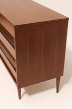 Right side panel of the dresser accentuating flat surface with light wear