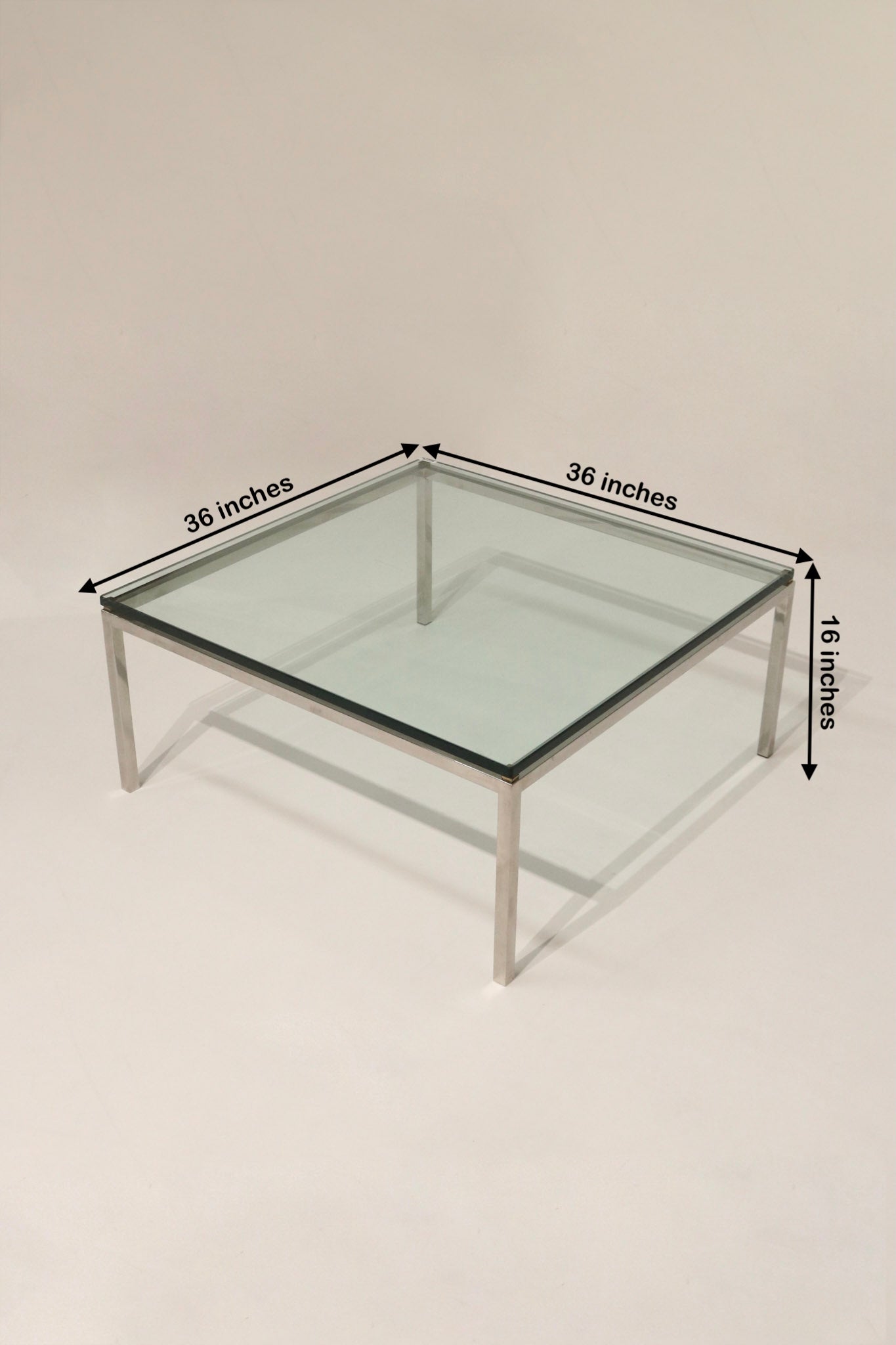 Close up of the solid glass top of the vintage table