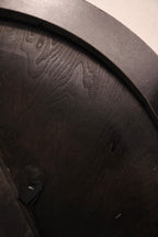 Close-up of wooden tabletop surface showing natural wood grain and minimal wear