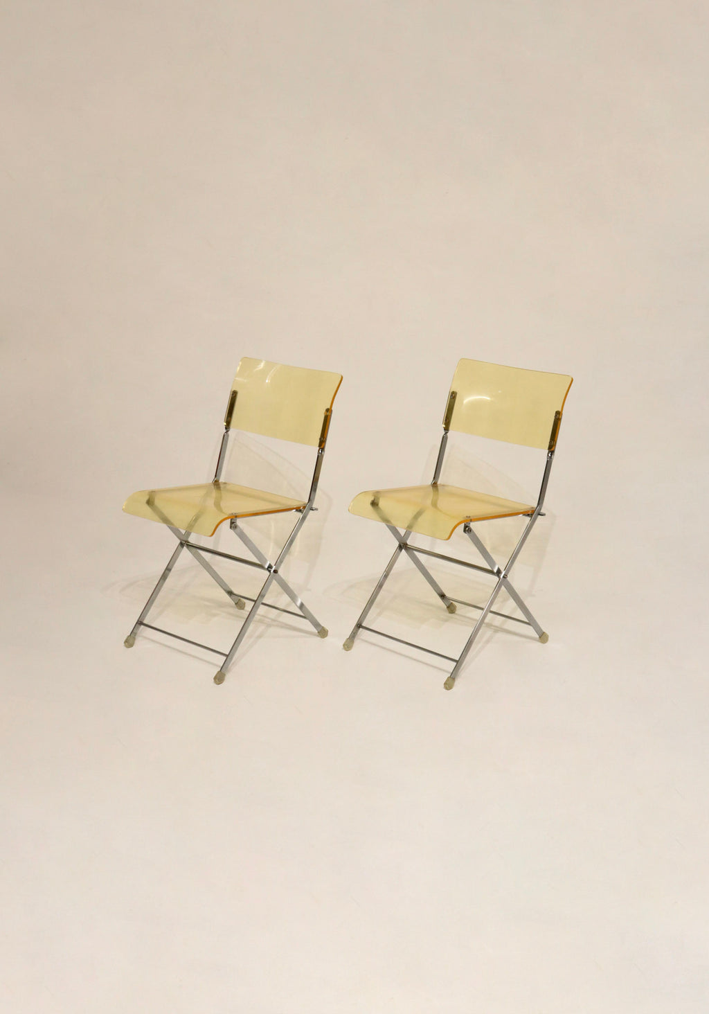 Vintage lucite and chrome folding chairs