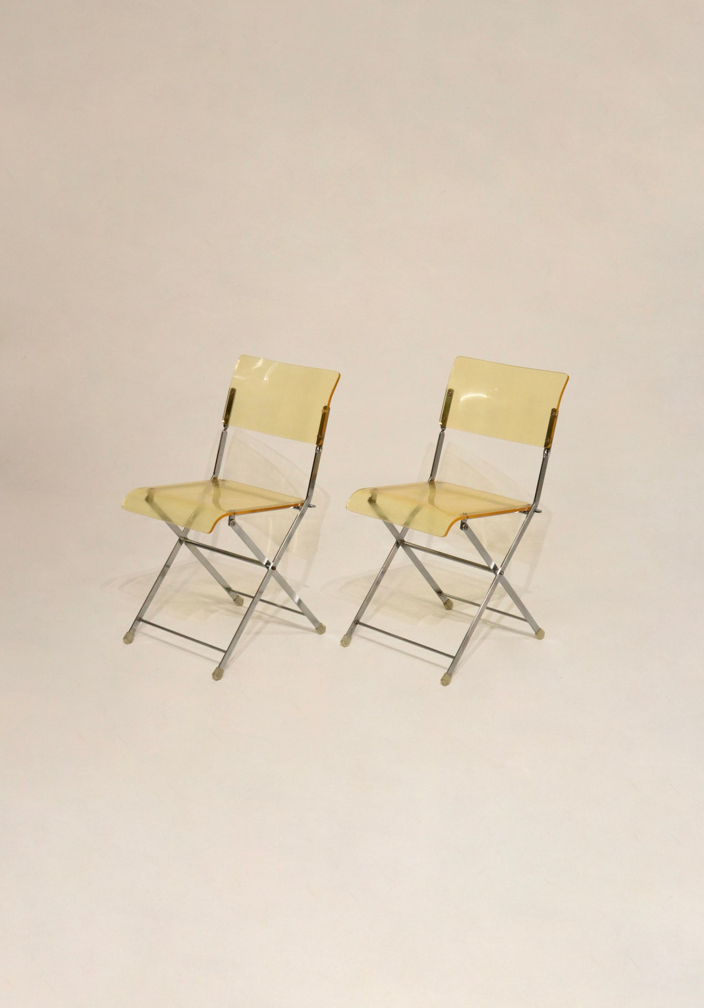 Vintage lucite and chrome folding chairs