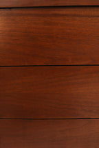 View of dresser top surface showing partial veneer with smooth, glossy finish