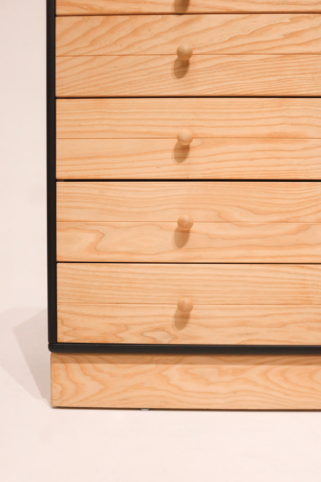 Detailed corner finish of small wood dresser showcasing Danish woodworking quality