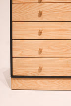 Detailed corner finish of small wood dresser showcasing Danish woodworking quality