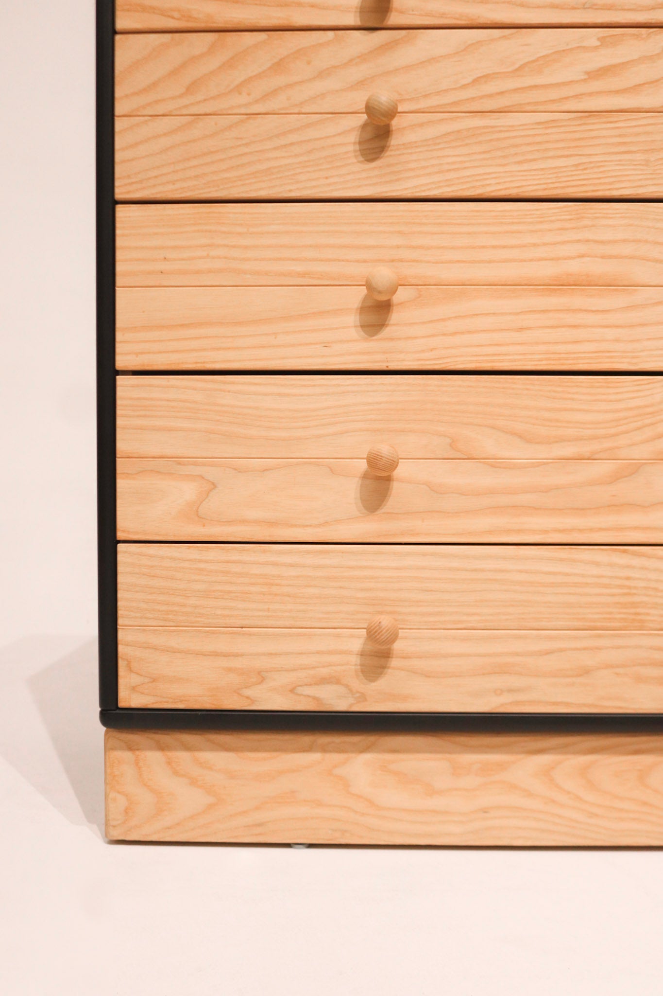 Detailed corner finish of small wood dresser showcasing Danish woodworking quality