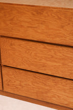 Handle and hardware close-up with vintage patina on wooden surface