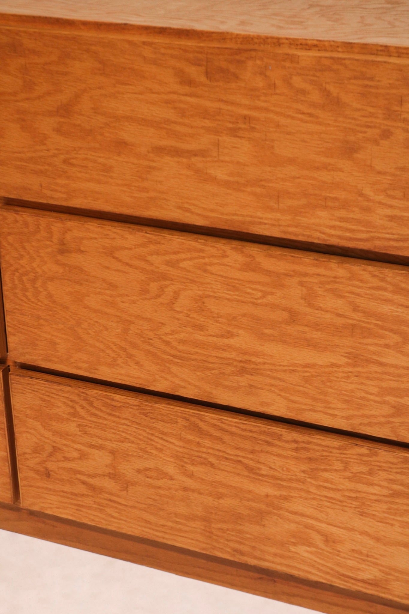 Handle and hardware close-up with vintage patina on wooden surface