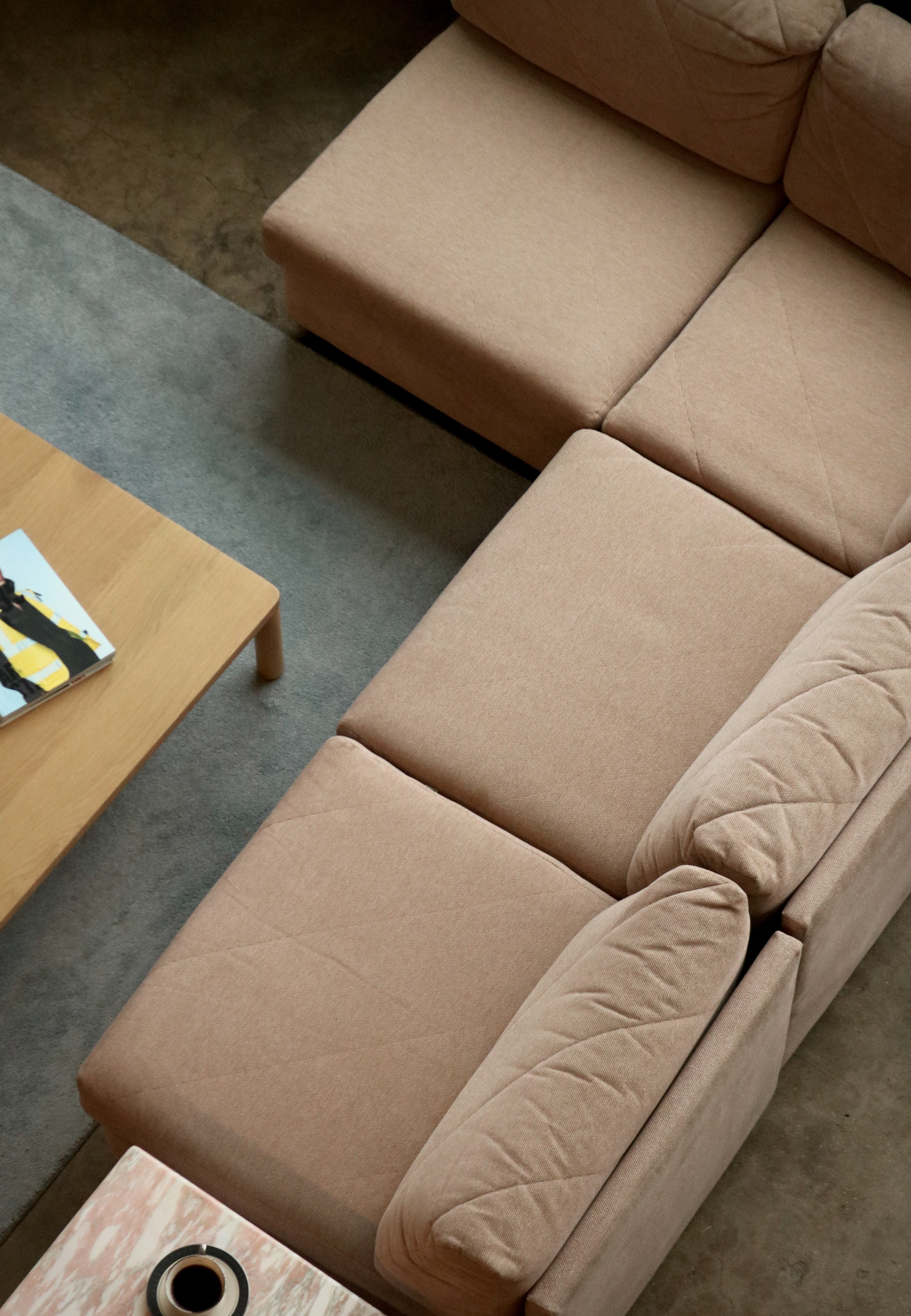 Image of missing label area on Mcm modular fabric sofa showing interior fabric, tag absence and well-built vintage frame construction