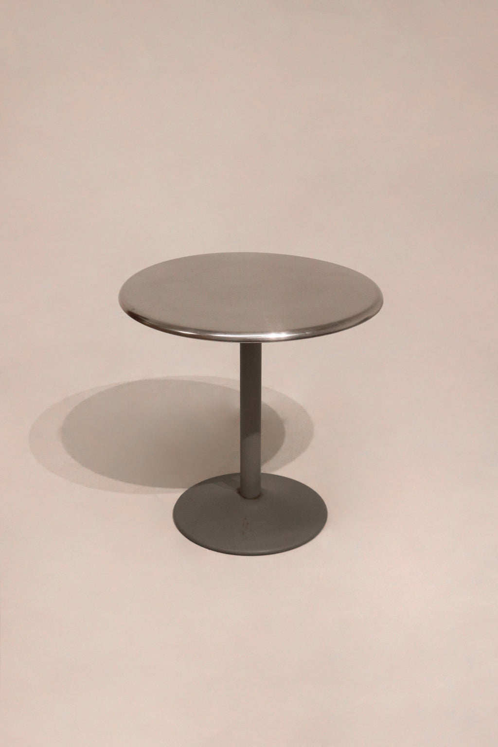 Main view of Industrial Round Steel Chromel Metal Bistro Table with sleek silver steel finish