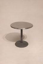 Main view of Industrial Round Steel Chromel Metal Bistro Table with sleek silver steel finish