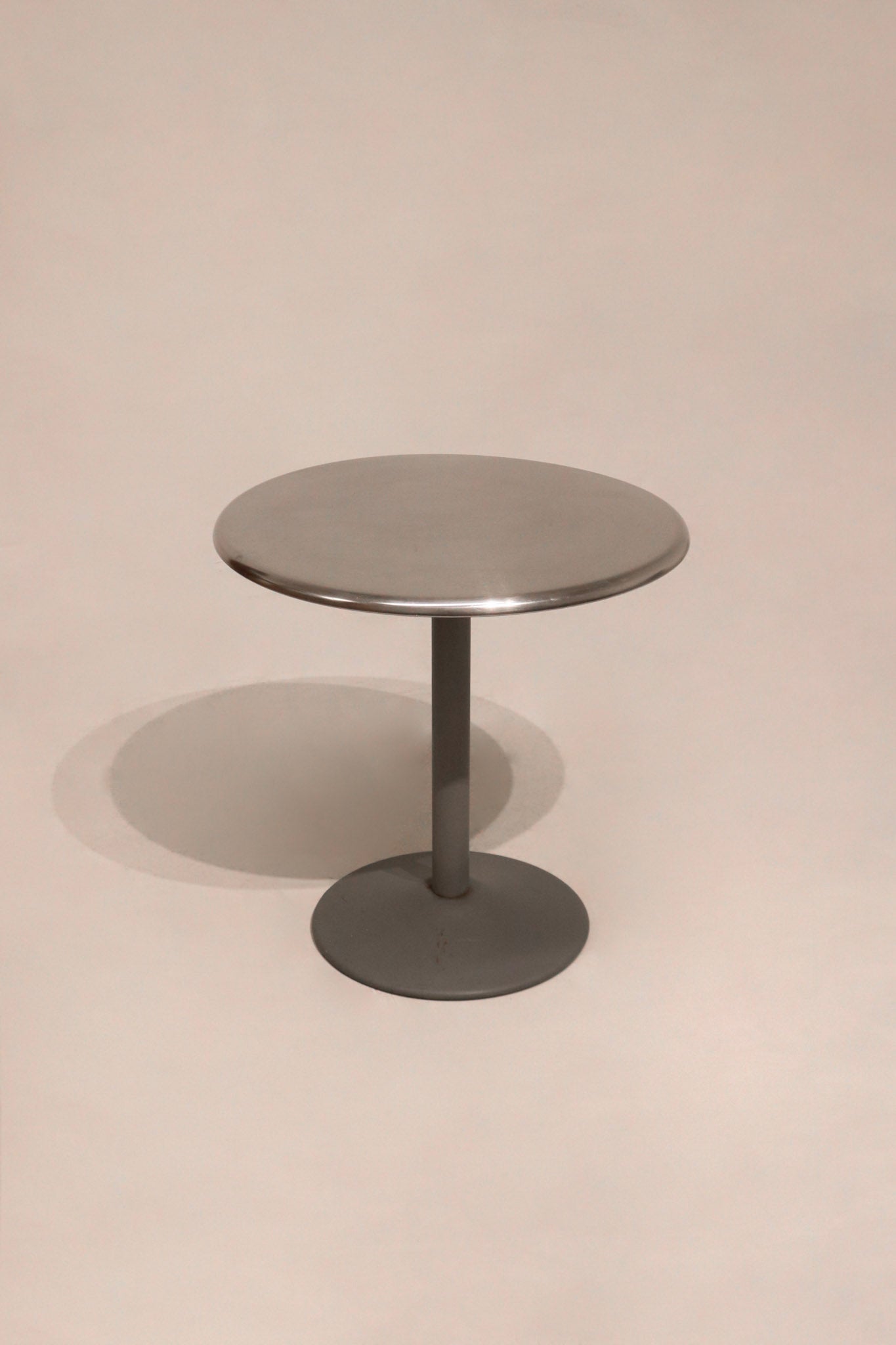 Main view of Industrial Round Steel Chromel Metal Bistro Table with sleek silver steel finish