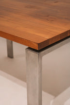 Zoomed view of one leg showing steel frame and light signs of wear near bottom