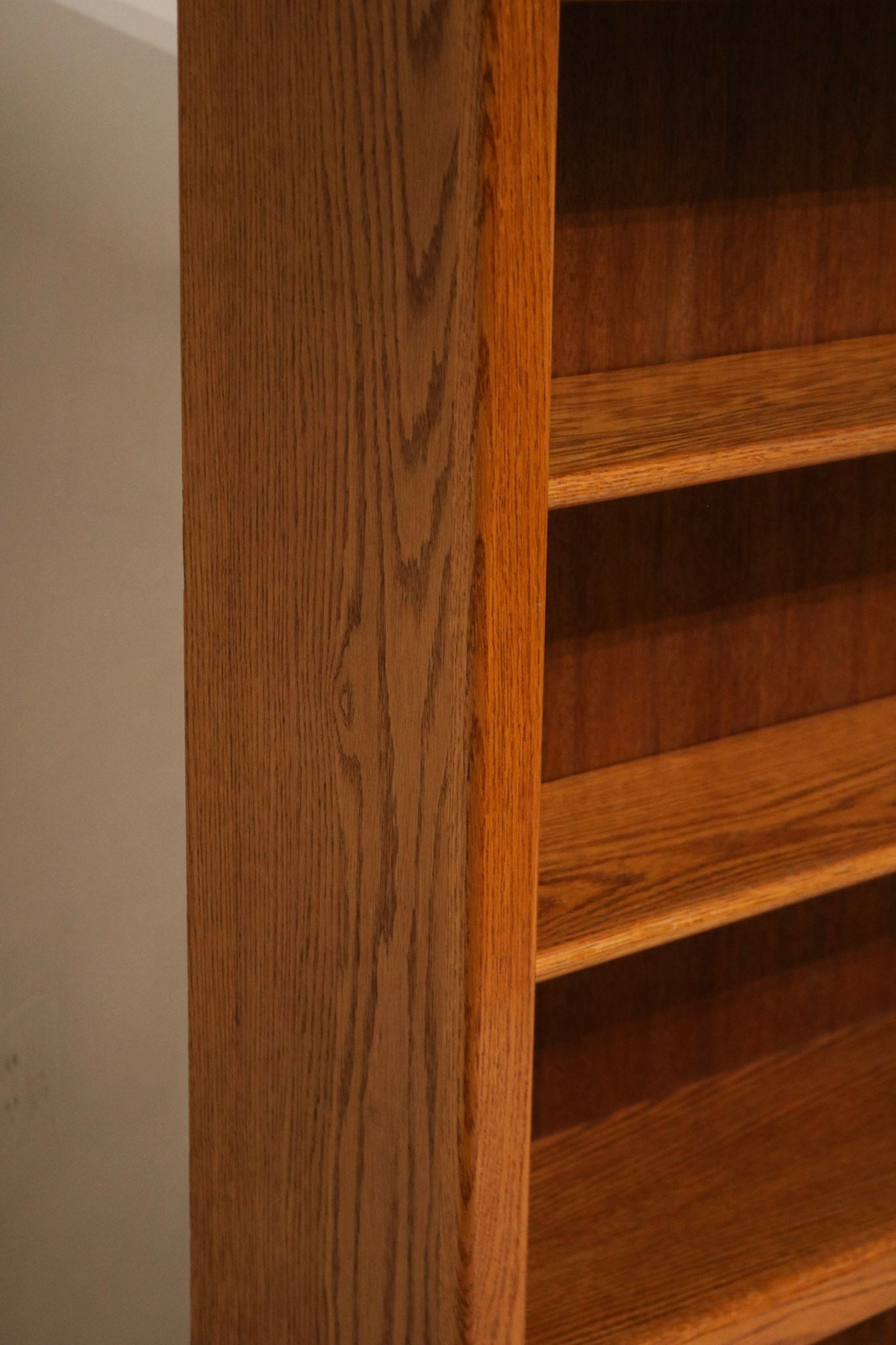 Detail of hardware and finish on vintage Mid-Century Modern wood cabinet