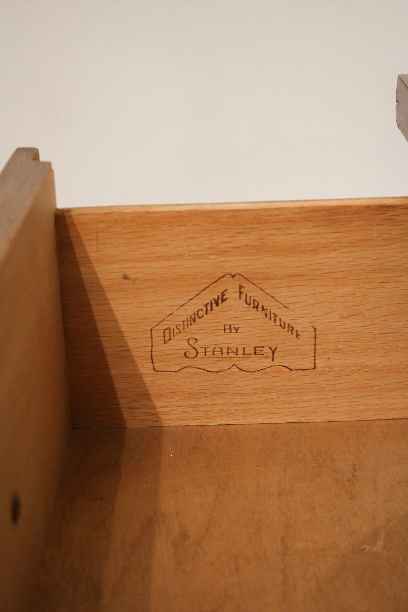 Zoom on the top surface showing minimal nicks and well-maintained walnut veneer