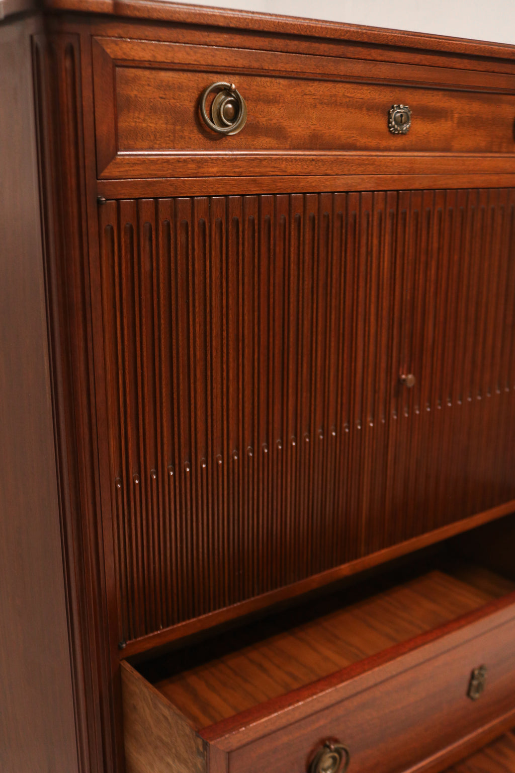 Side panel close-up highlighting the joinery and contrast between mahogany and walnut