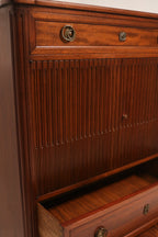 Side panel close-up highlighting the joinery and contrast between mahogany and walnut