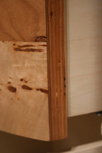 Top view of nightstands emphasizing smooth grain pattern and glossy wood texture
