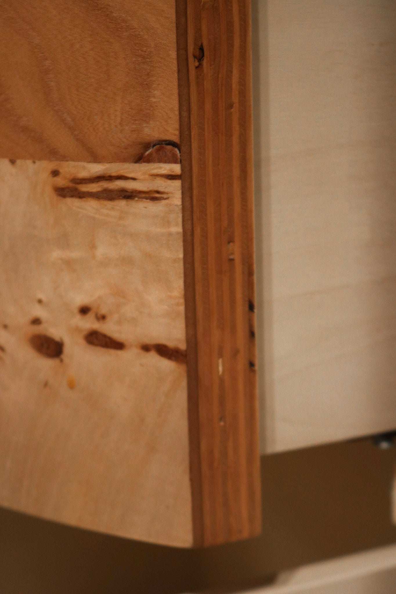 Top view of nightstands emphasizing smooth grain pattern and glossy wood texture