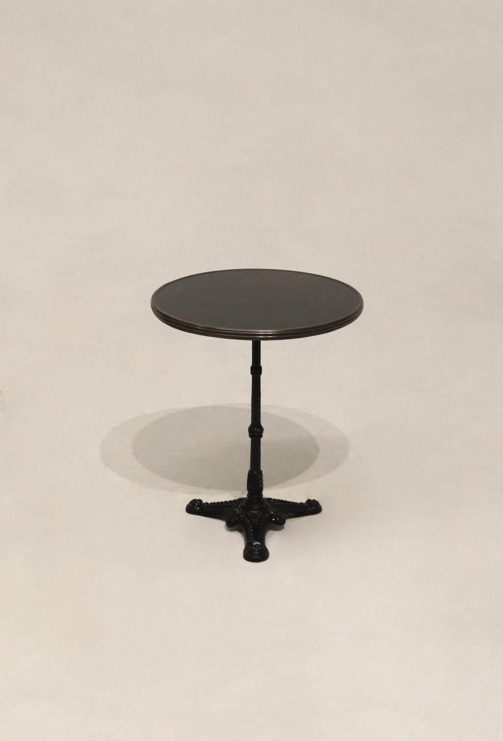 Full view of Vintage Stone Iron Metal Round Bistro Table showing stone top and iron base in perfect condition