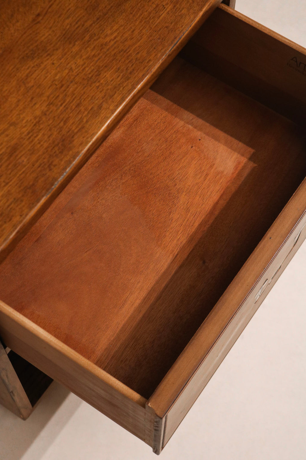Drawer construction detail showing dovetail joints and smooth sliding functionality