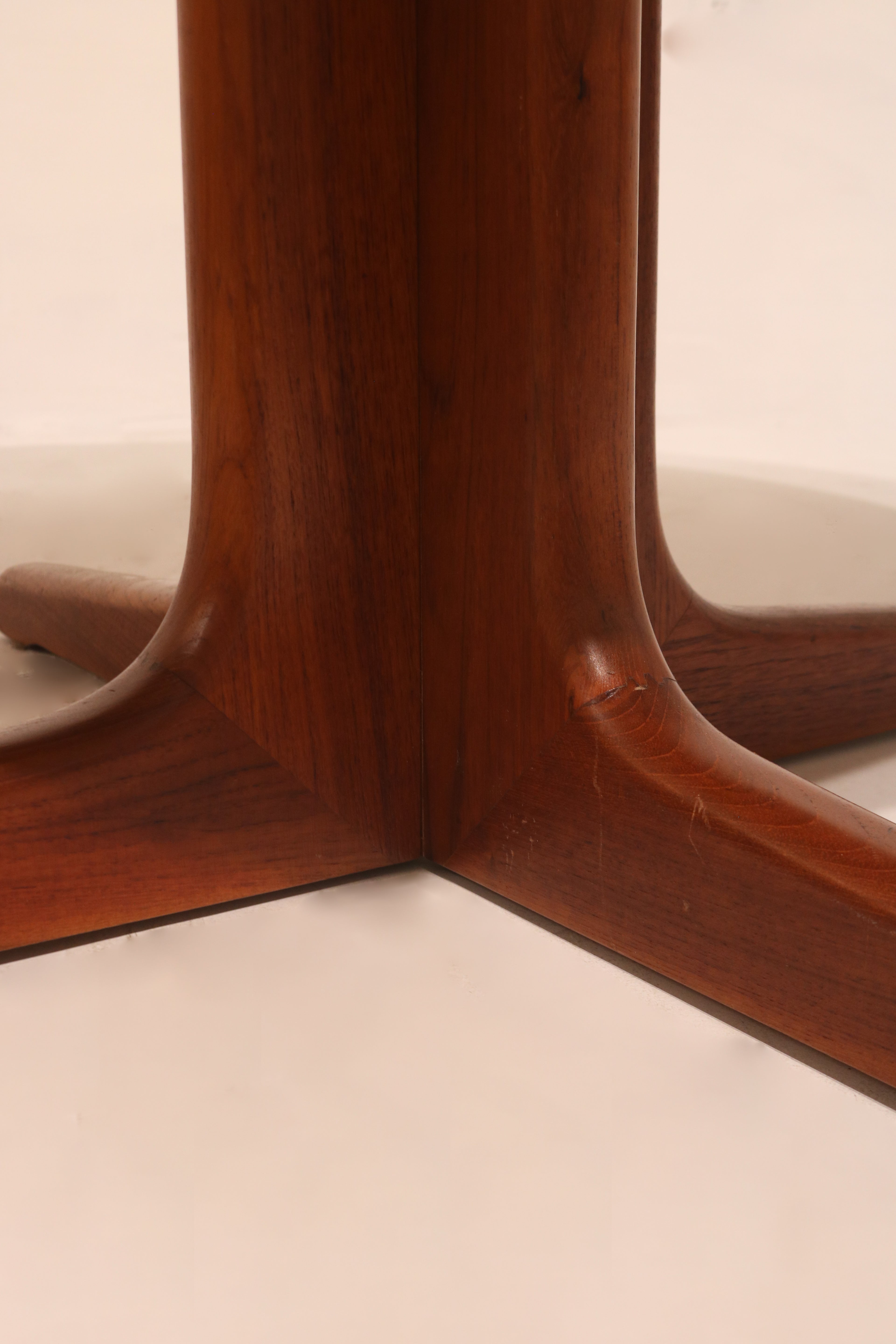 Close-up of teak wood grain highlighting natural finish and mid-century craftsmanship